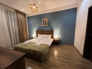 Voodi või voodid majutusasutuse Hotel King Tom toas