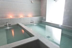 Bazén v ubytování Curia Palace Hotel & Spa nebo v jeho okolí