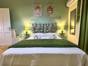 Letto o letti in una camera di Alba e i Mori
