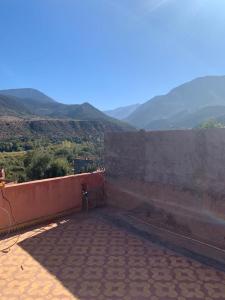 a balcony with a view of the mountains at Grand Atlas Guesthouse 44 km from Marrakech in Marrakech