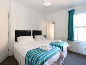 Ένα ή περισσότερα κρεβάτια σε δωμάτιο στο Birch House