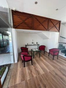 Uma área de estar em Hotel Peninsula
