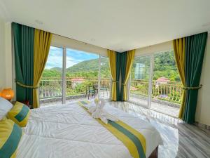 Postel nebo postele na pokoji v ubytování Summer Resort + 37 fotografií