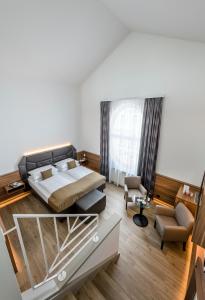 Vuode tai vuoteita majoituspaikassa IMLAUER Hotel Nestroy Wien