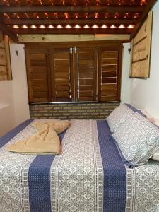 Ένα ή περισσότερα κρεβάτια σε δωμάτιο στο Buda Guajirú - Pé na areia - Praia de Guajirú