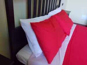 Łóżko lub łóżka w pokoju w obiekcie Agriturismo La Farazzina