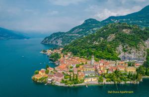 an aerial view of a town on a small island in the water at Del Duca Apartment in Varenna