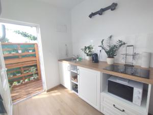 Kuchnia lub aneks kuchenny w obiekcie Attic apartment Catnip