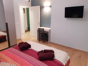 Posteľ alebo postele v izbe v ubytovaní Colour House