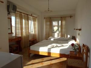 Postel nebo postele na pokoji v ubytování Paris Beach Hotel