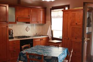 Кухня или мини-кухня в B&B Al Borgo
