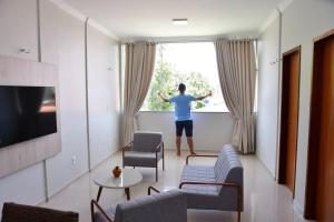 TV a/nebo společenská místnost v ubytování Casa das Dunas Residence até 8 pessoas (apto 1)