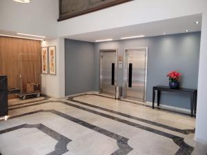 Lobbyn eller receptionsområdet på Flat Manhattan Residence Service