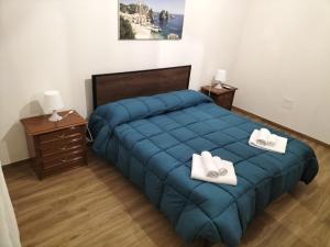 Postel nebo postele na pokoji v ubytování Scirocco e Maestrale