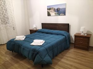 Postel nebo postele na pokoji v ubytování Scirocco e Maestrale