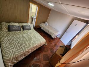 Postel nebo postele na pokoji v ubytování HOSTAL SOL ATACAMA -CALDERA