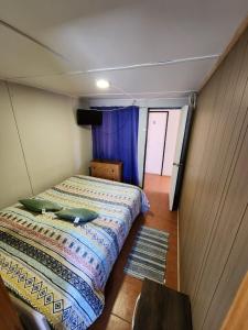 Postel nebo postele na pokoji v ubytování HOSTAL SOL ATACAMA -CALDERA