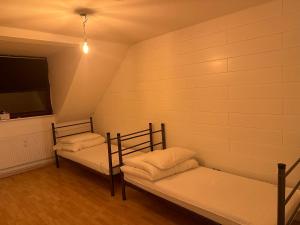 Voodi või voodid majutusasutuse Pauli Hostel toas