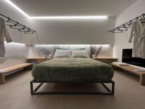 a bedroom with a large bed in a room at Seacity Suite & Stay in Monopoli