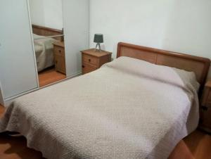 En eller flere senge i et værelse på Colibrí