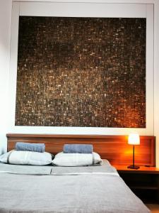 Posteľ alebo postele v izbe v ubytovaní Panoráma Gold Wellness Apartman
