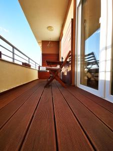 Balkón alebo terasa v ubytovaní Panoráma Gold Wellness Apartman