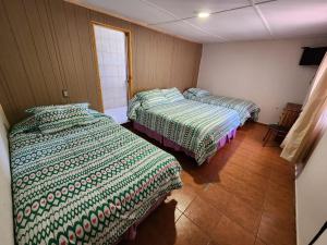 Postel nebo postele na pokoji v ubytování HOSTAL SOL ATACAMA -CALDERA