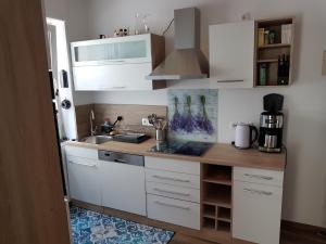 Η κουζίνα ή μικρή κουζίνα στο Haus Rheinglück "Sterrenberg"
