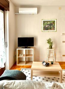 TV a/nebo společenská místnost v ubytování Gurej Casa Vacanze