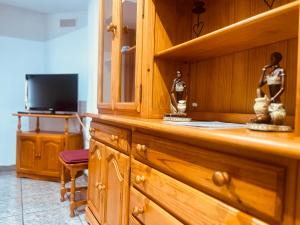 TV a/nebo společenská místnost v ubytování Apartamento La Ermita