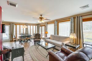 a living room with a couch and a table at Hawley Home with Deck 4 Mi to Berkshire East Resort in Hawley