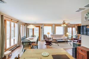 a living room with a couch and a table at Hawley Home with Deck 4 Mi to Berkshire East Resort in Hawley
