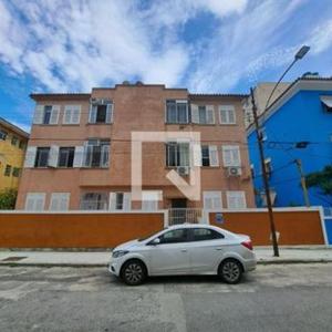 a white car parked in front of a building at Apartamento Mobiliado - Botafogo in Rio de Janeiro