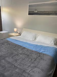 Postel nebo postele na pokoji v ubytování La casa di Cate & Adry