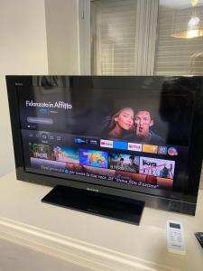 TV a/nebo společenská místnost v ubytování La casa di Cate & Adry