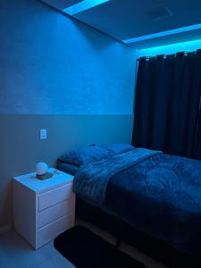 Uma cama ou camas num quarto em Apartamento Completo Jatiúca