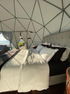 Postel nebo postele na pokoji v ubytování Andino Glamping