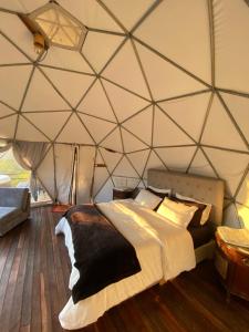 Postel nebo postele na pokoji v ubytování Andino Glamping