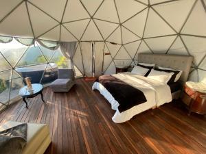 Postel nebo postele na pokoji v ubytování Andino Glamping