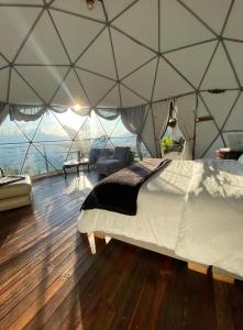 Postel nebo postele na pokoji v ubytování Andino Glamping