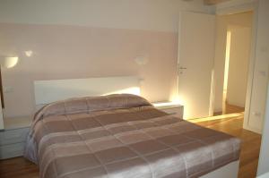 Katil atau katil-katil dalam bilik di Locazione turistica Aquila