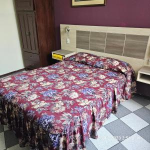 Postel nebo postele na pokoji v ubytování Hostal La Cascada