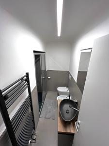 Vonios kambarys apgyvendinimo įstaigoje ADG Apartment 97