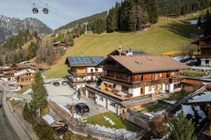 an aerial view of a house in a mountain at Haus Forelle in Inneralpbach