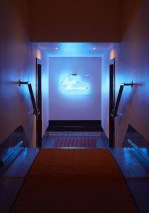 Neptune, an Ash Hotel客房内的一张或多张床位