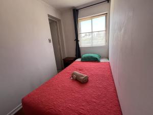 Postel nebo postele na pokoji v ubytování Hostal Arlegui - Viña Centro