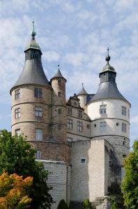 an old castle with two towers on top of it at Studio de 30m² hypercentre très calme in Montbéliard
