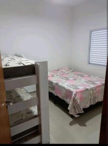 เตียงในห้องที่ Casa do Ninho 1