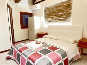 Cama o camas de una habitación en Venice Rainbow Apartments San Zaccaria 2