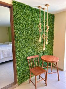 Cama ou camas em um quarto em Humaita Pousada